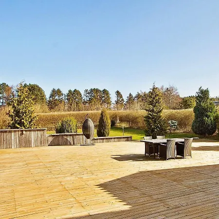 Сasa de vacaciones Two-bedroom Holiday In Henne 9 *